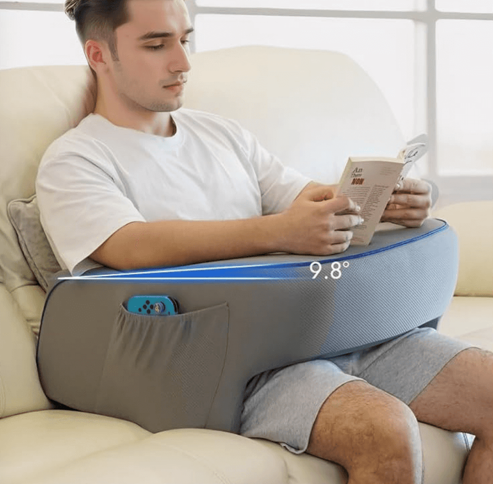 With it: reading, forearms on the padded armrests